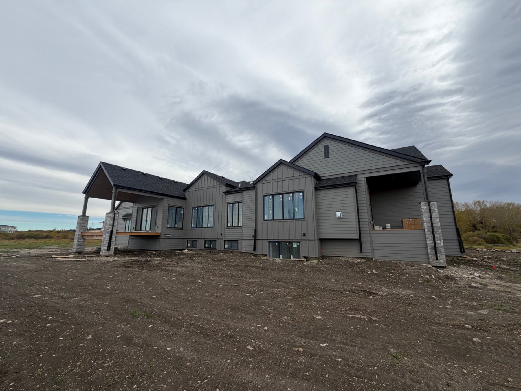 Completed exterior siding and covered entry